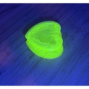 Yellow heart shaped Vaseline Uranium Glass glows trinket dish